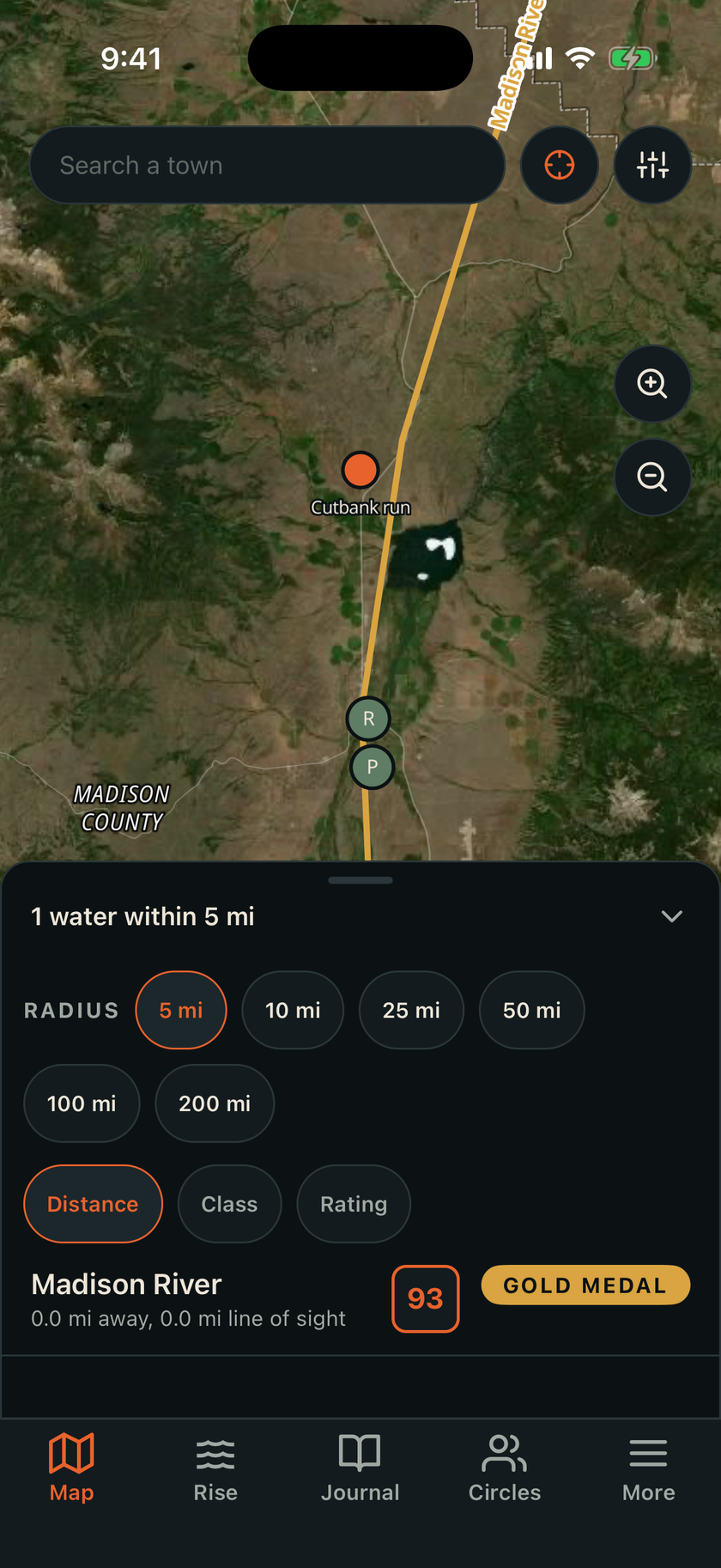 The RiseCast map over satellite imagery of the Madison River near Ennis, Montana, showing the river traced in gold for its Gold Medal class, green access point markers, a saved spot named Cutbank run, and a results sheet listing Madison River with a Fishability Score of 93.